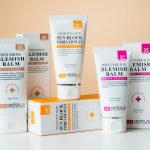 A collection of skincare products including blemish balms and sunblock for sensitive skin with SPF protection.